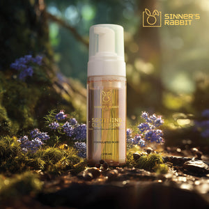 Ready to Use Soothing Clove Soap in 150ml bottle on a natural background with flowers.