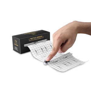 Thinnest Tattoo Armor Bandage product with a hand holding a sheet of bandage