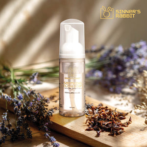 Ready to Use Soothing Clove Soap in 60ml bottle which Naturally Soothe and Protect - Natural background with levender flower