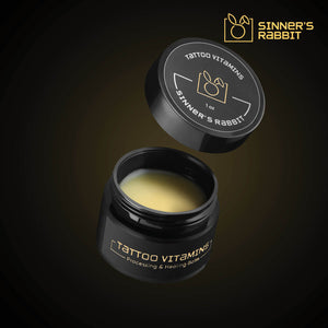 Open container of Tattoo Vitamins, Protecting & Healing Balm in 1oz by Sinner's Rabbit